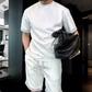 Minimalistisches Sommer-Zweiteiler aus Kurzarm-Top und Shorts für Herren