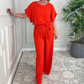 Damen-Jumpsuit mit lockerem Schnitt, kurzen Ärmeln, Gürtel und weitem Bein