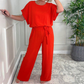 Damen-Jumpsuit mit lockerem Schnitt, kurzen Ärmeln, Gürtel und weitem Bein
