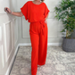 Damen-Jumpsuit mit lockerem Schnitt, kurzen Ärmeln, Gürtel und weitem Bein