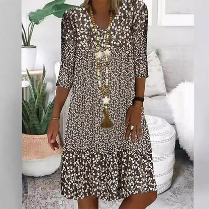 Modisches Damenkleid mit Print, V-Ausschnitt und halblangen Ärmeln